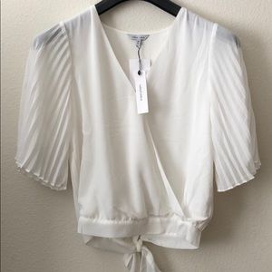 Women Sassy Cross blouse Size M V neck bell sleeves, sexy cross open in the back